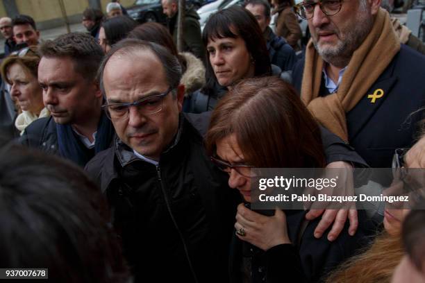 Catalan leader Jordi Turull hugs his wife as he returns from a break during a hearing at the Supreme Court on March 23, 2018 in Madrid, Spain. A...