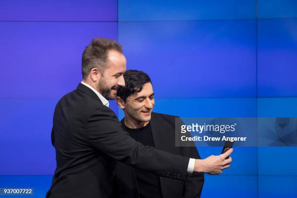 Dropbox CEO Drew Houston and Dropbox co-founder Arash Ferdowsi take a photo together before the launch of Dropbox's initial public offering at Nasdaq...