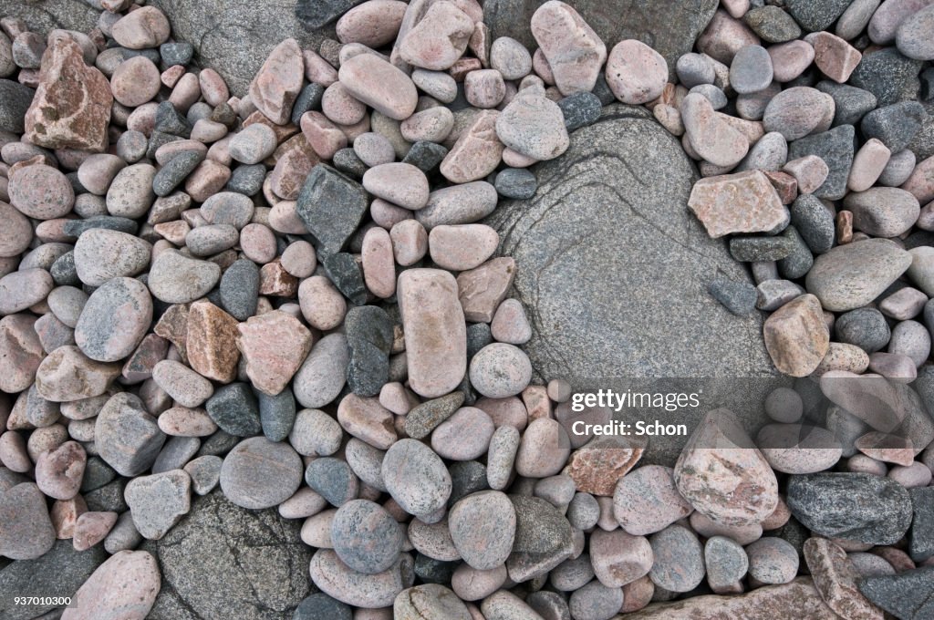 Shapes and patterns of a collection of round stones