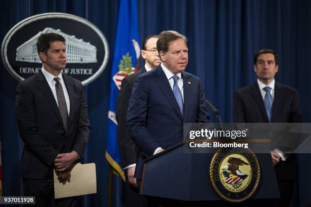 Geoffrey Berman, U.S. Attorney for the Southern District of New York, center, speaks during a news conference on cyber law enforcement at the...