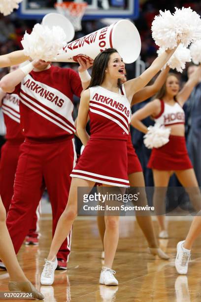 The Arkansas dance team and cheerleaders entertain during the NCAA Division I Men's Championship First Round basketball game between the Arkansas...