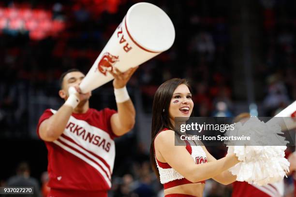 The Arkansas dance team and cheerleaders entertain during the NCAA Division I Men's Championship First Round basketball game between the Arkansas...
