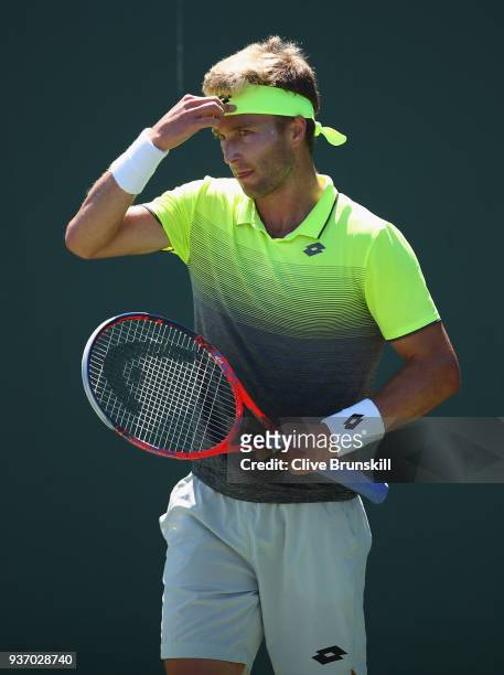 Liam Broady of Great Britain shows his dejection against Filip Krajinovic of Serbia in their second round match during the Miami Open Presented by...