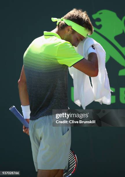 Liam Broady of Great Britain shows his dejection against Filip Krajinovic of Serbia in their second round match during the Miami Open Presented by...