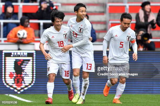 Shoya Nakajima of Japan celebrates 1-1 with Yu Kobayashi of Japan, Yuto Nagatomo of Japan during the International Friendly match between Japan v...