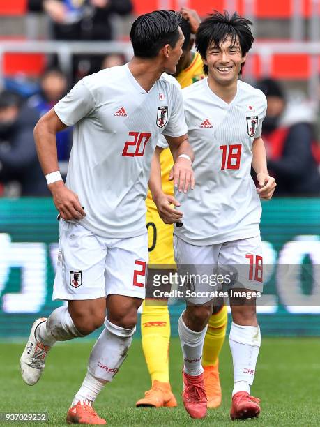 Shoya Nakajima of Japan celebrates 1-1 with Tomoaki Makino of Japan during the International Friendly match between Japan v Mali at the Stade Maurice...