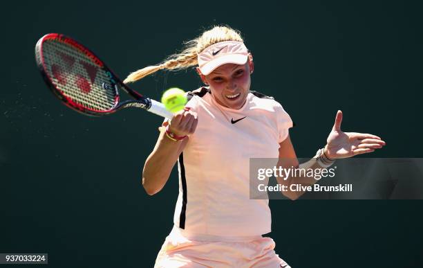 Donna Vekic of Croatia plays a forehand against Elena Vesnina of Russia in their second round match during the Miami Open Presented by Itau at...