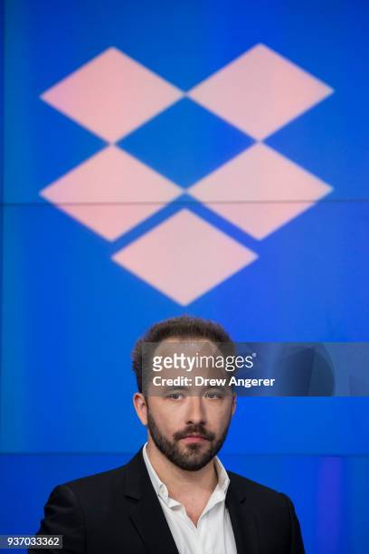Dropbox CEO Drew Houston looks on before the launch of Dropbox's initial public offering at Nasdaq MarketSite, March 23, 2018 in New York City....