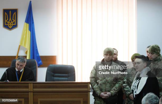 Ukrainian lawmaker Nadiya Savchenko speaks during a court hearing on a preventive punishment for her at a district court in Kiev, Ukraine, 23 March,...