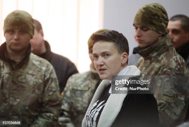 Ukrainian lawmaker Nadiya Savchenko speaks during a court hearing on a preventive punishment for her at a district court in Kiev, Ukraine, 23 March,...