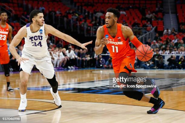 Syracuse Orange forward Oshae Brissett drives to the basket against TCU Horned Frogs guard Kenrich Williams during the NCAA Division I Men's...