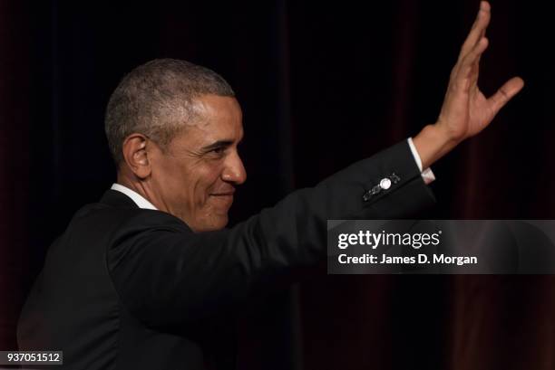 Barack Obama waves goodbye to the audience as he attends a talk at the Art Gallery Of NSW on March 23, 2018 in Sydney, Australia. The former US...