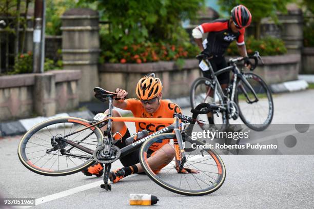 Lukasz Owsian of CCC Sprandi Polkowice Poland crashes with Abdul Gani of KFC Cycling Team during Stage 6 of the Le Tour de Langkawi 2018,...