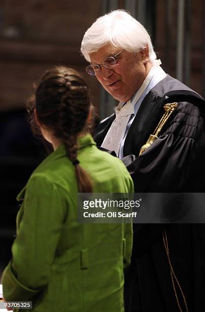 Defendant Amanda Knox speaks to her lawyer Luciano Ghirga during the Meredith Kercher trial's closing arguments on December 3, 2009 in Perugia,...