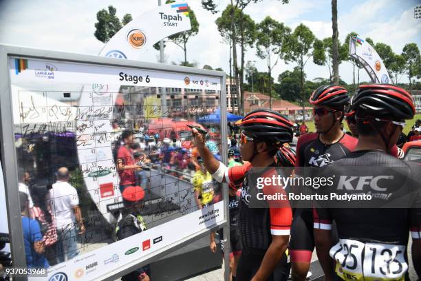 Cycling Team Indonesia riders sign on during Stage 6 of the Le Tour de Langkawi 2018, Tapah-Tanjung Malim 108.5 km on March 23, 2018 in Tanjung...