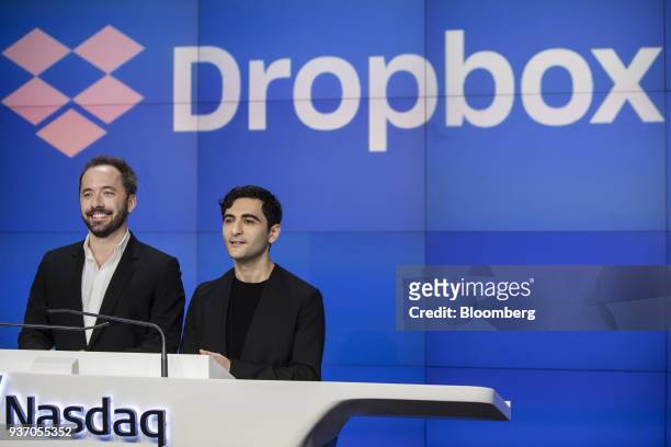 Drew Houston, chief executive officer and co-founder of Dropbox Inc., left, and Arash Ferdowsi, co-founder of Dropbox Inc., smile during the...