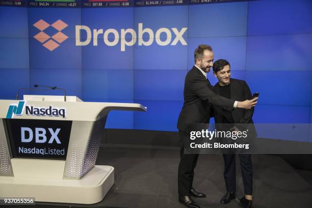 Drew Houston, chief executive officer and co-founder of Dropbox Inc., left, and Arash Ferdowsi, co-founder of Dropbox Inc., take a selfie photograph...