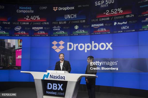Drew Houston, chief executive officer and co-founder of Dropbox Inc., left, speaks as Arash Ferdowsi, co-founder of Dropbox Inc., listens during the...
