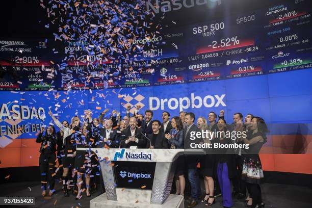 Drew Houston, chief executive officer and co-founder of Dropbox Inc., center left, and Arash Ferdowsi, co-founder of Dropbox Inc., center right,...