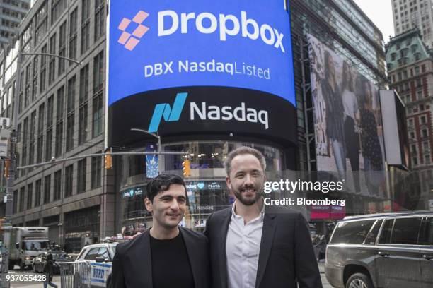 Drew Houston, chief executive officer and co-founder of Dropbox Inc., right, and Arash Ferdowsi, co-founder of Dropbox Inc., stand for a photograph...