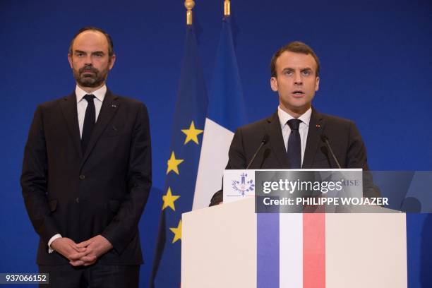 French President Emmanuel Macron and Prime Minister Edouard Philippe arrive to deliver a speech in Paris after a hostage situation in a supermarket...