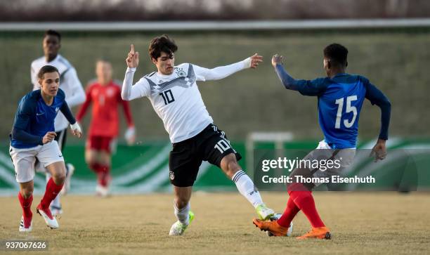 Elias Abouchabaka of Germany and Aurelien Tchouameni of France vie for the ball during the U18 international friendly match between Germany and...