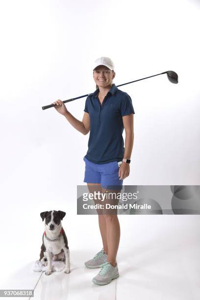 Cindy LaCrosse and her dog Fitz pose for a portrait during the LPGA KIA CLASSIC at the Park Hyatt Aviara on March 21, 2018 in Carlsbad, California.