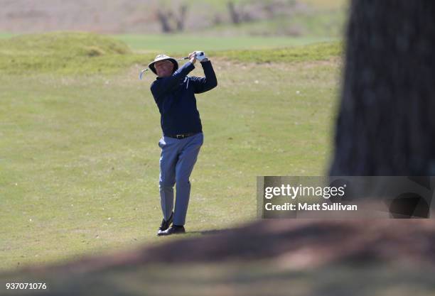 Kirk Triplett watches his second shot on the 10th hole during the first round of the Rapiscan Systems Classic at Fallen Oak Golf Course on March 23,...
