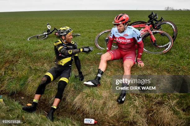 French Yohann Gene of Direct Energie and Austrian Marco Haller of Katusha-Alpecin sits on the verge after a fall during the 61st edition of the 'E3...