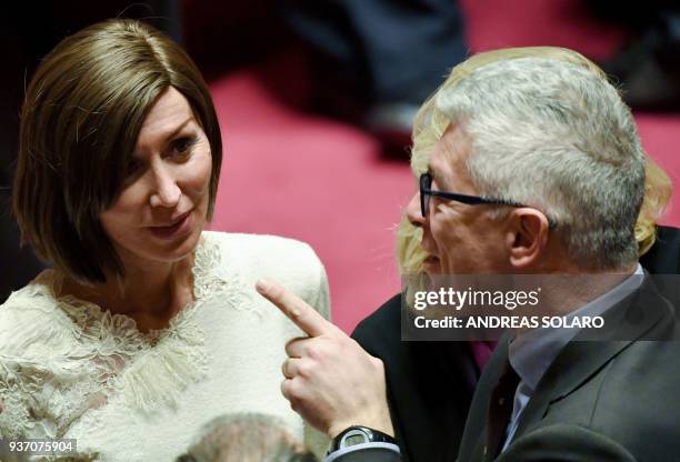 Forza Italia senator Anna Maria Bernini talks with a senator at the Senate during the first session, in Rome on March 23, 2018 following the March 4...