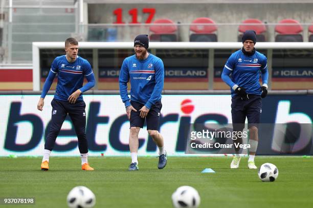 Bjorn Sigurðarson, Captain Aron Gunnarsson and Alfreð Finnbogason warm up during the Iceland training session ahead of the FIFA friendly match...