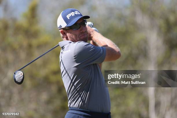 Grant Waite of New Zealand watches his tee shot on the 11th hole during the first round of the Rapiscan Systems Classic at Fallen Oak Golf Course on...