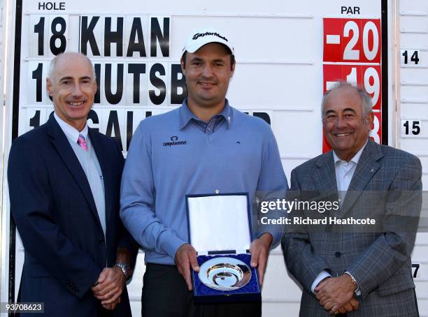 Tournament Director Mike Stewart, Simon Khan of England and Angel Gallardo, Vice-Chairman of the PGA European Tour Board of Directors pose with the...