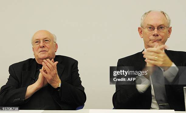 Belgian cardinal Godfried Danneels and former Belgian Prime Minister and new President of European Commission Herman Van Rompuy speak to the press at...