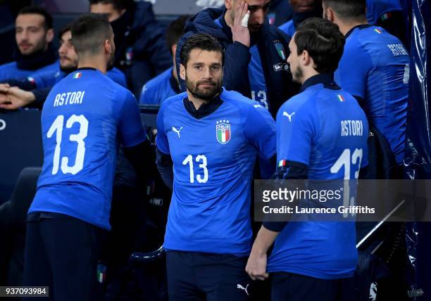 Antonio Candreva of Italy and his fellow Italy substitutes wear Davide Astori shirts in memory of him prior to the International friendly match...