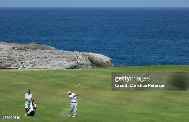 Brendon de Jonge of Zimbabwe plays his second shot on the eighth hole during round two of the Corales Puntacana Resort & Club Championship on March...