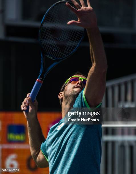 Victor Troicki, from Serbia, in action during his first round match at the Miami Open against Denis Shapovalov on March 23, 2018 in Key Biscayne,...