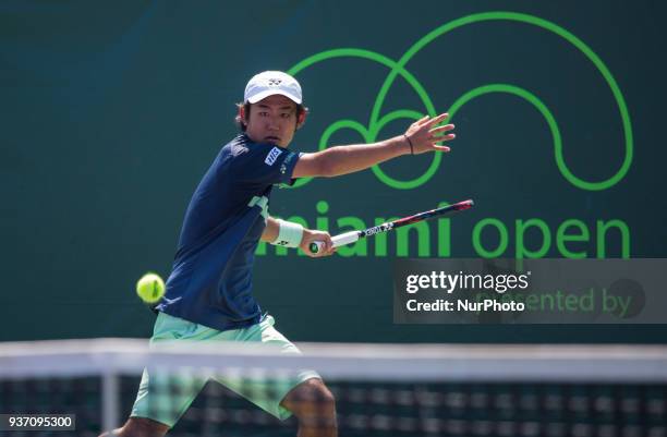 Yoshihito Nishioka, from Japan, in action against Alex De Minaur, from Australia, during his first round match at the Miami Open on March 23, 2018 in...