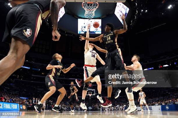 Walker of the Florida State Seminoles fouls Jacob Larsen of the Gonzaga Bulldogs during the third round of the 2018 NCAA Photos via Getty Images...