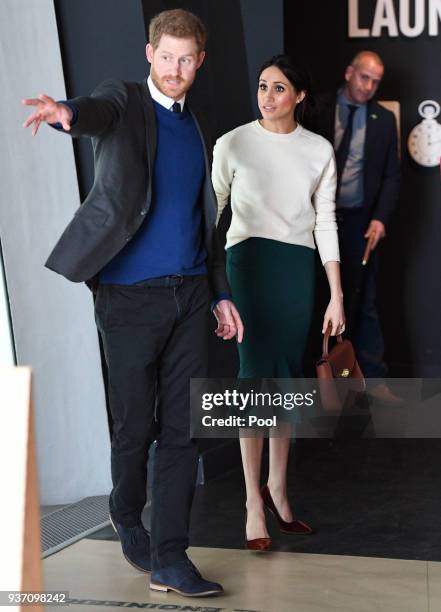 Prince Harry and Meghan Markle during a visit to Titanic Belfast maritime museum on March 23, 2018 in Belfast, Nothern Ireland.