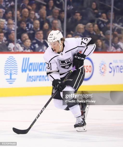 Tyler Toffoli of the Los Angeles Kings plays the puck down the ice during third period action against the Winnipeg Jets at the Bell MTS Place on...