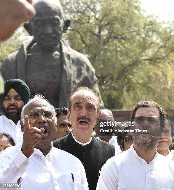 Congress President Rahul Gandhi leads Congress protest outside Parliament House against NDA government during Budget Session on March 23, 2018 in New...