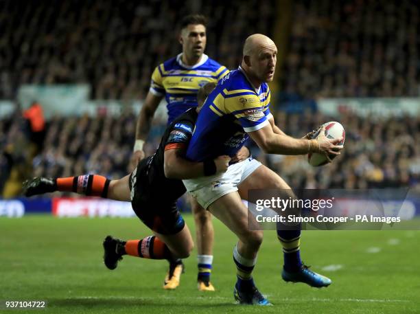 Leeds Rhinos' Carl Ablett is tackled by Castleford Tigers' Paul McShane during the Betfred Super League match at Elland Road, Leeds.