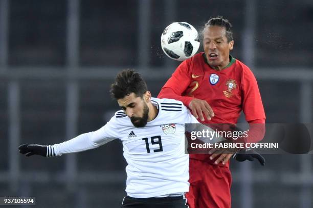 Portugal's defender Bruno Alves vies with Egypt's midfielder Abdallah Said during their international friendly football match between Portugal and...