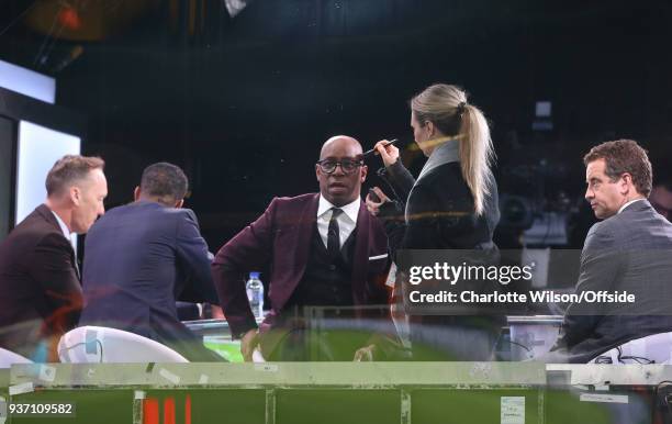 Ian Wright has make up applied to his head in the television studio before the International Friendly match between Netherlands and England at...