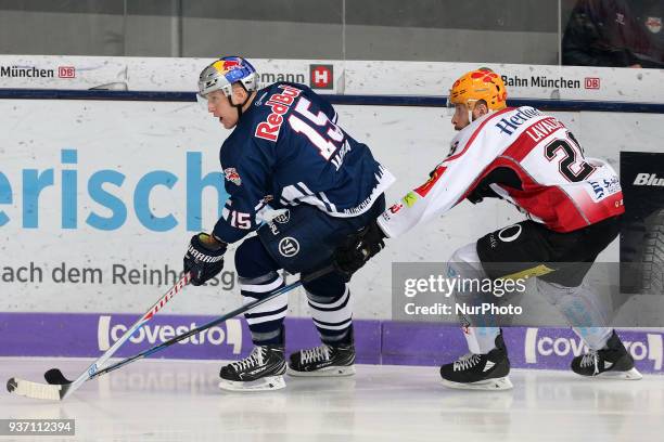 Kevin Lavallee of Pinguins Bremerhaven vies Jason Jaffray of Red Bull Munich during the DEL Playoff Quarterfinal match 5 between the EHC Red Bull...