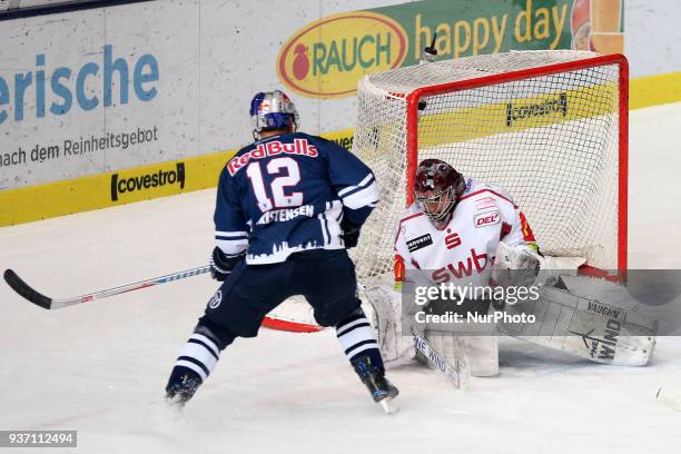 Mads Christensen of Red Bull Munich and Tomas Poepperle of Pinguins Bremerhaven during the DEL Playoff Quarterfinal match 5 between the EHC Red Bull...