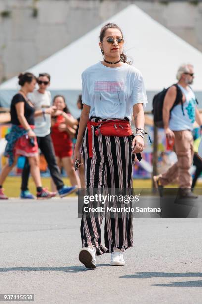 Street style of a music fan during the first day of Lollapalooza Brazil festival at Interlagos Racetrack on March 23, 2018 in Sao Paulo, Brazil.