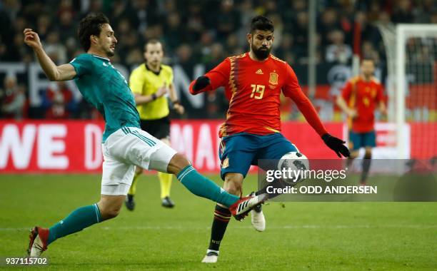 Spain's forward Diego da Silva Costa and Germany's defender Mats Hummels vie for the ball during the international friendly football match of Germany...