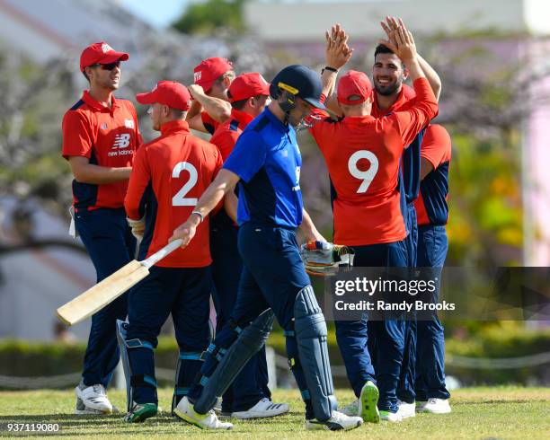 Saqib Mahmood and North teammates celebrate the dismissal of Laurie Evans of South during the ECB North v South Series match Three at 3Ws Oval on...